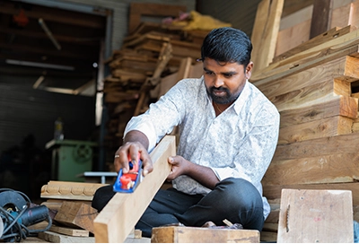 MSME customer working at a carpentry workshop